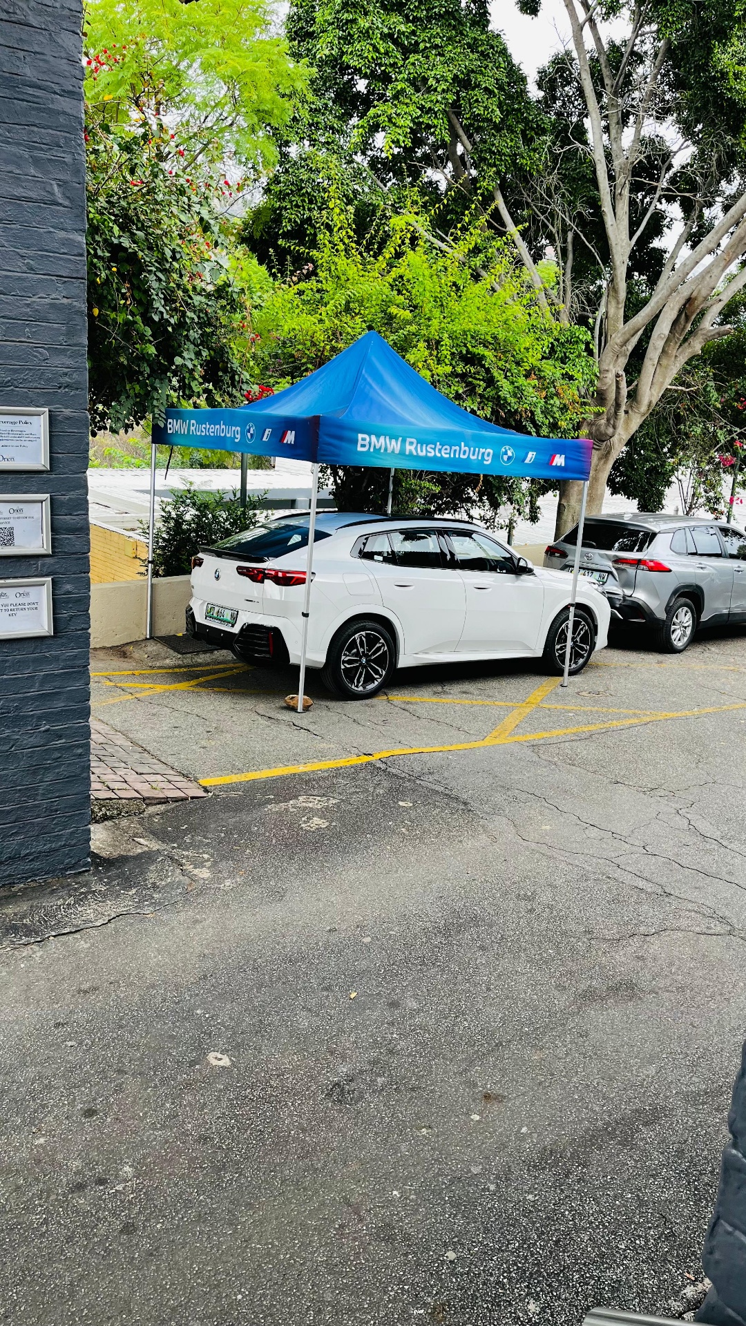 BMW Rustenburg branded stall showcasing a white BMW M-Series at the RCCET AGM 2026